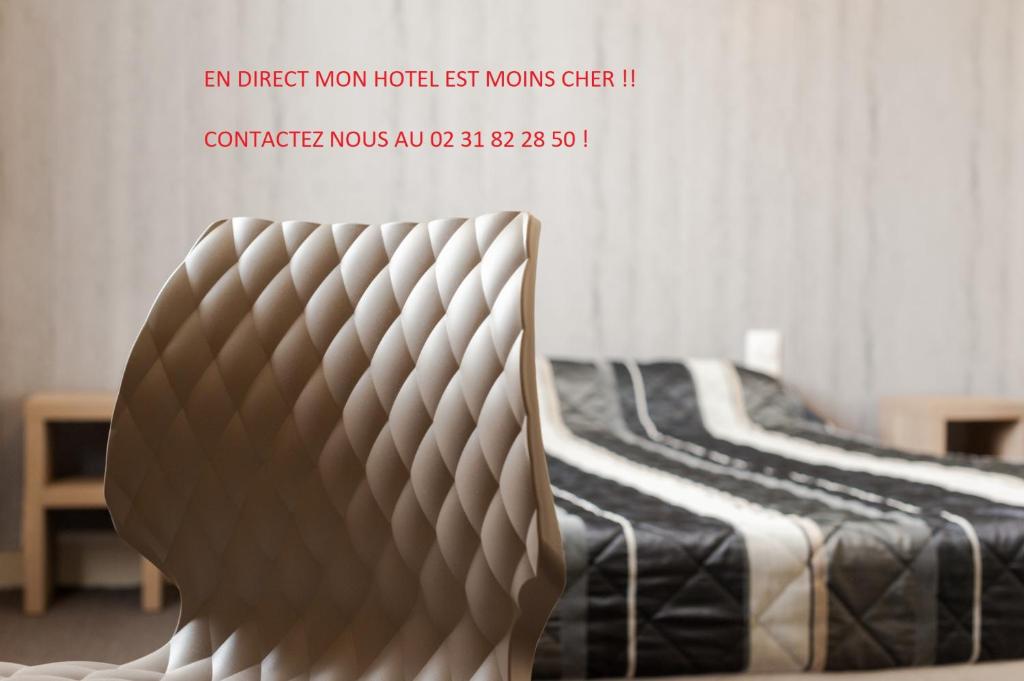 Postel nebo postele na pokoji v ubytování The Originals City, Hôtel Le Savoy, Caen