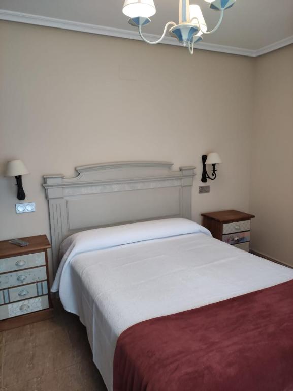 Posteľ alebo postele v izbe v ubytovaní Apartamentos Costa Noja