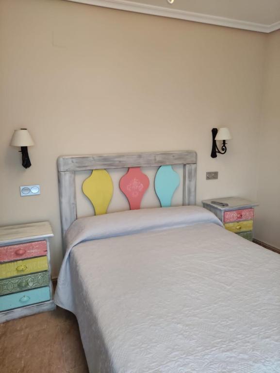 Posteľ alebo postele v izbe v ubytovaní Apartamentos Costa Noja