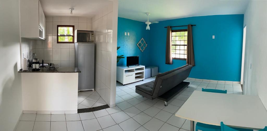 Køkken eller tekøkken på Condomio Coqueiros Residence