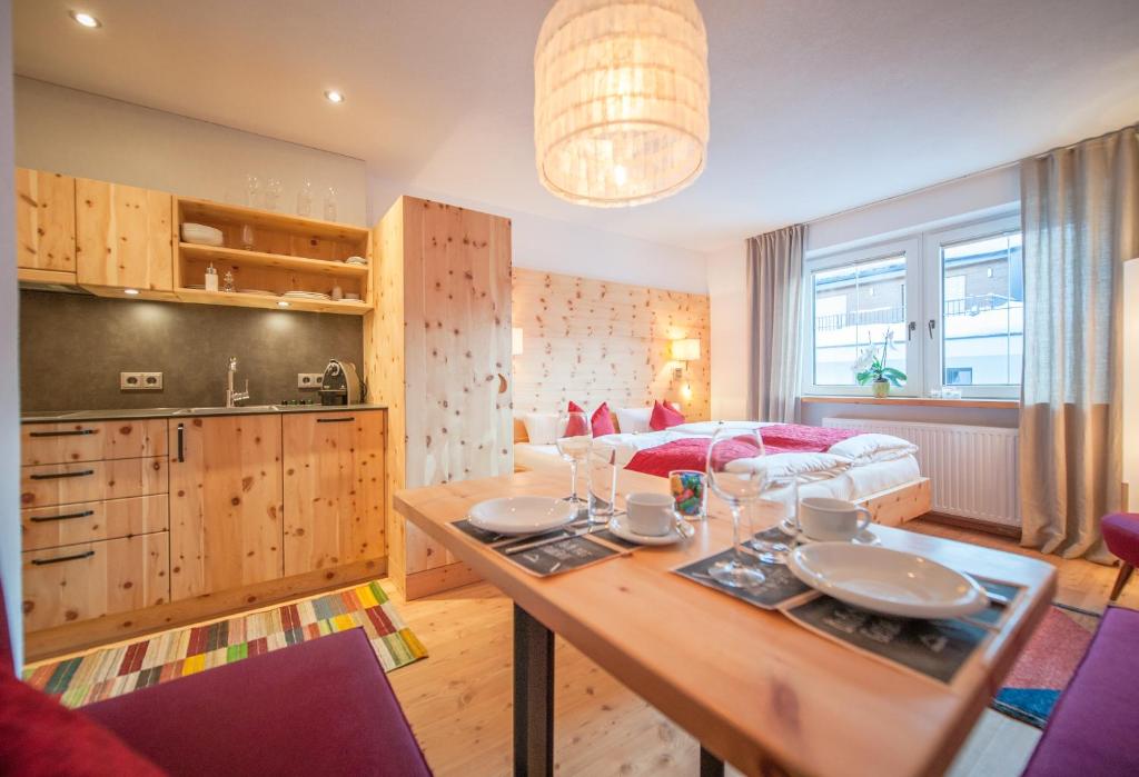Kuchyň nebo kuchyňský kout v ubytování Arlsuites