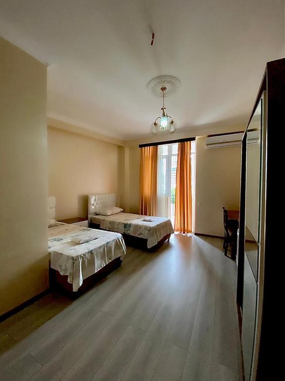 Postel nebo postele na pokoji v ubytování Hotel Eurasia