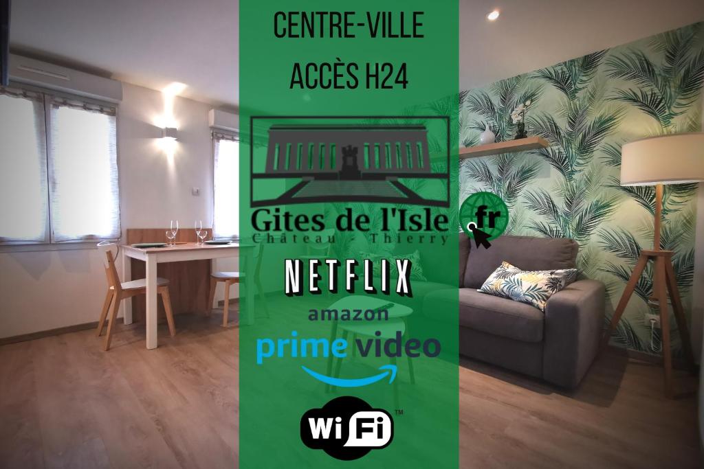 a green sign in a living room with a couch at Gîtes de l'isle Centre-Ville - WiFi Fibre - Netflix, Disney, Amazon - Séjours Pro in Château-Thierry