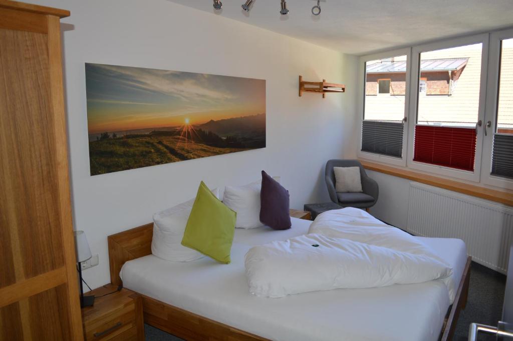 Postel nebo postele na pokoji v ubytování Grüner Hut - DEIN BERGHOTEL