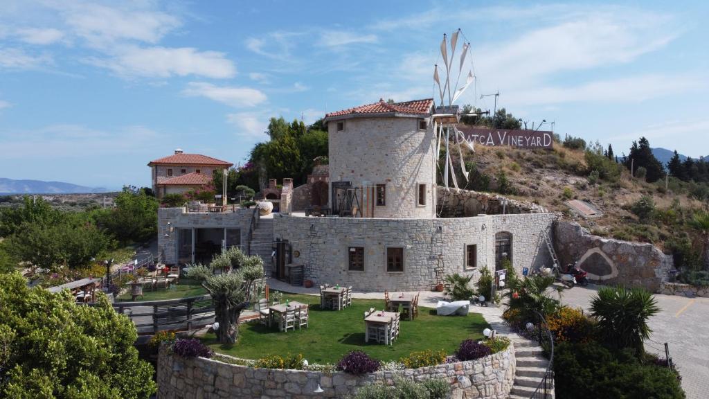 a house on the side of a hill at Datça Vineyard in Datca