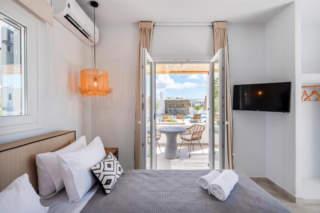 Postel nebo postele na pokoji v ubytování Drios Luxury Studios