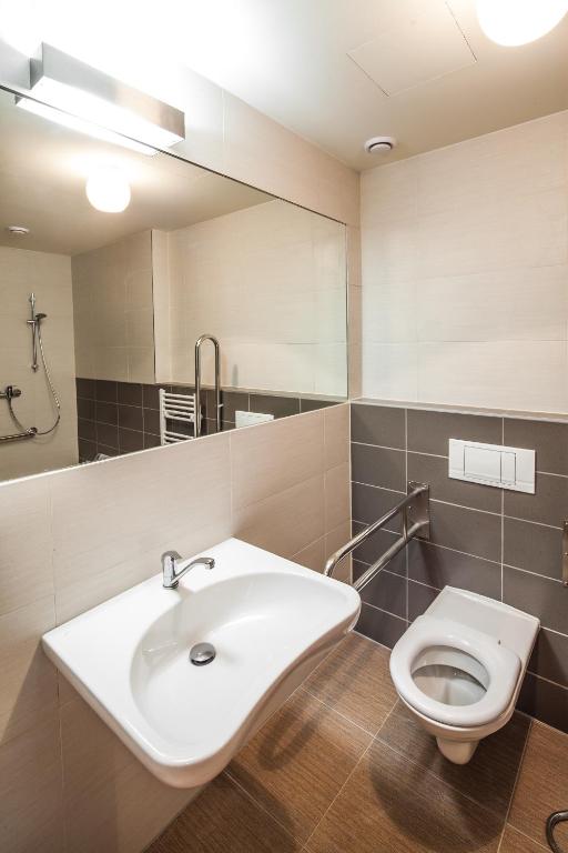 Koupelna v ubytování Resort Líšenský Dvůr