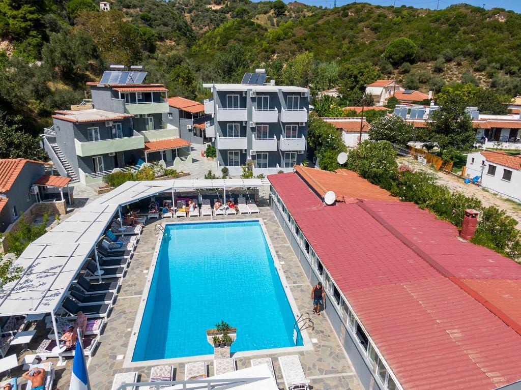 an overhead view of a swimming pool in a resort at Cabana Studios & Apartments in Kolios