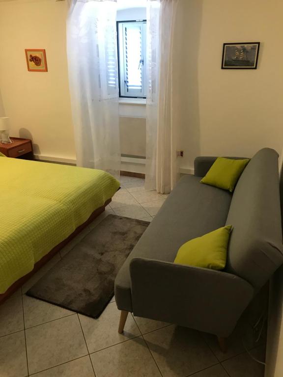 Posteľ alebo postele v izbe v ubytovaní Apartments Aleksandar 2