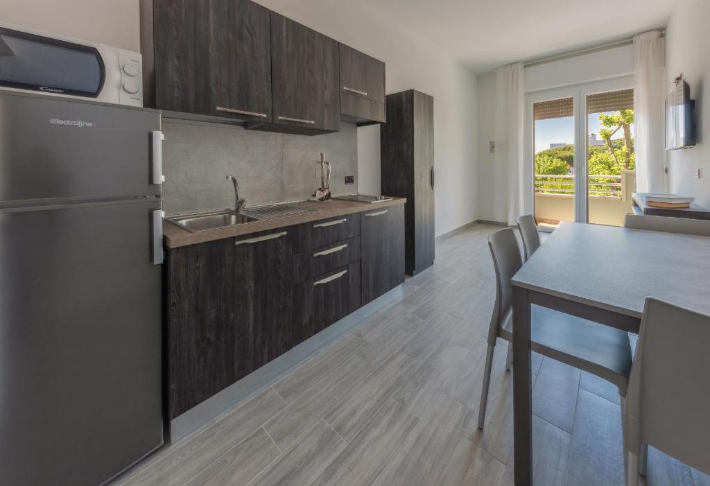 A kitchen or kitchenette at Residence Renadoro