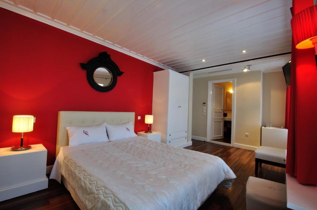 Postel nebo postele na pokoji v ubytování il Palazzo Rooms & Suites