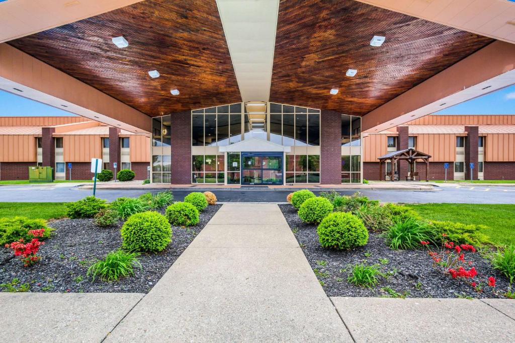 a large building with a walkway in front of it at Quality Inn & Suites Florence - Cincinnati South in Florence