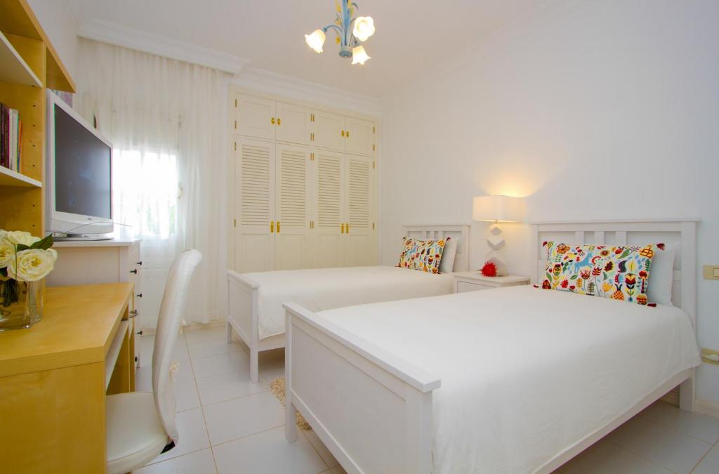 A bed or beds in a room at SUEÑOS DEL MAR by Buenavilla