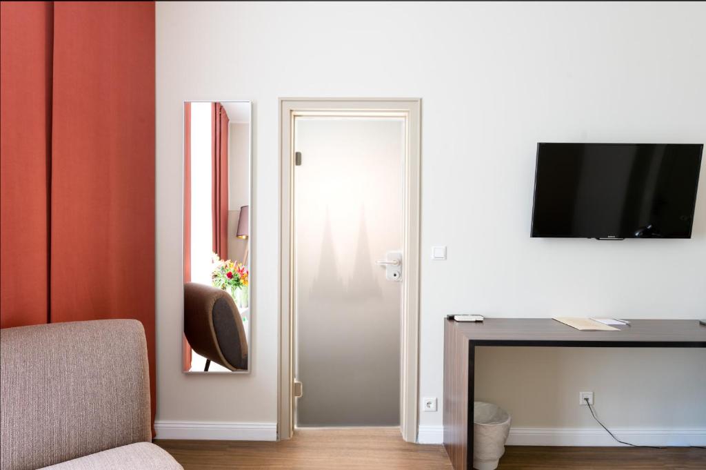 TV a/nebo společenská místnost v ubytování Hotel Casa Colonia