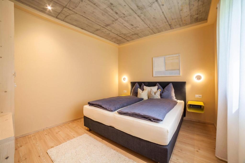 Postel nebo postele na pokoji v ubytování Apartment Das Eckige