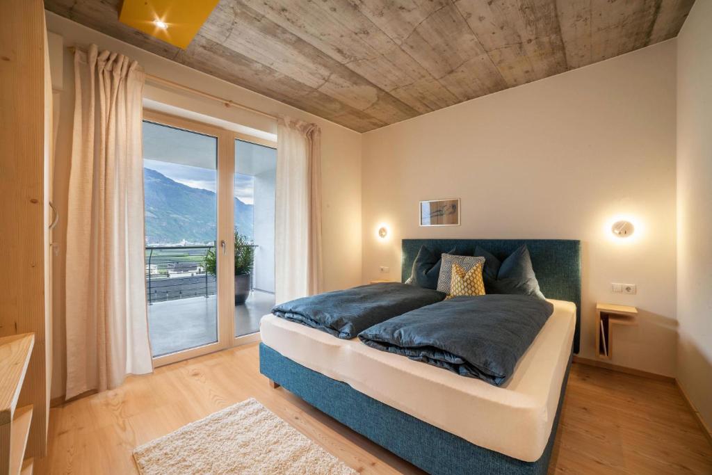 Postel nebo postele na pokoji v ubytování Apartment Das Eckige