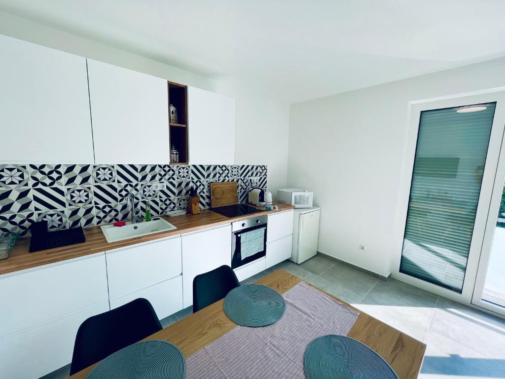 Fotografia z galérie ubytovania Léna Apartments v destinácii Balatonalmádi