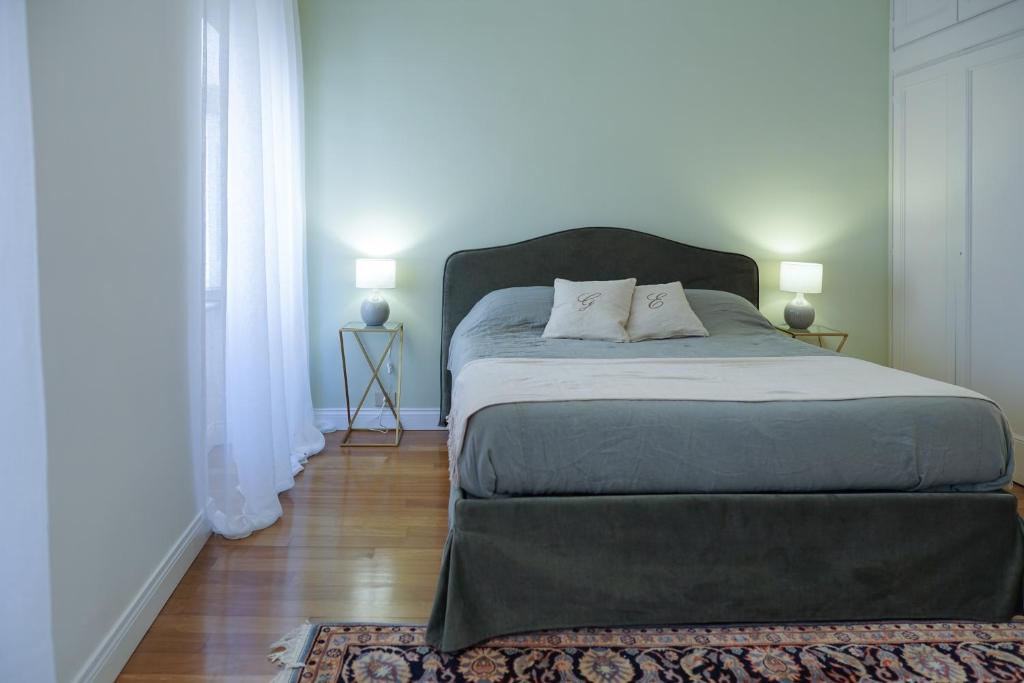 Łóżko lub łóżka w pokoju w obiekcie Barberini Apartment
