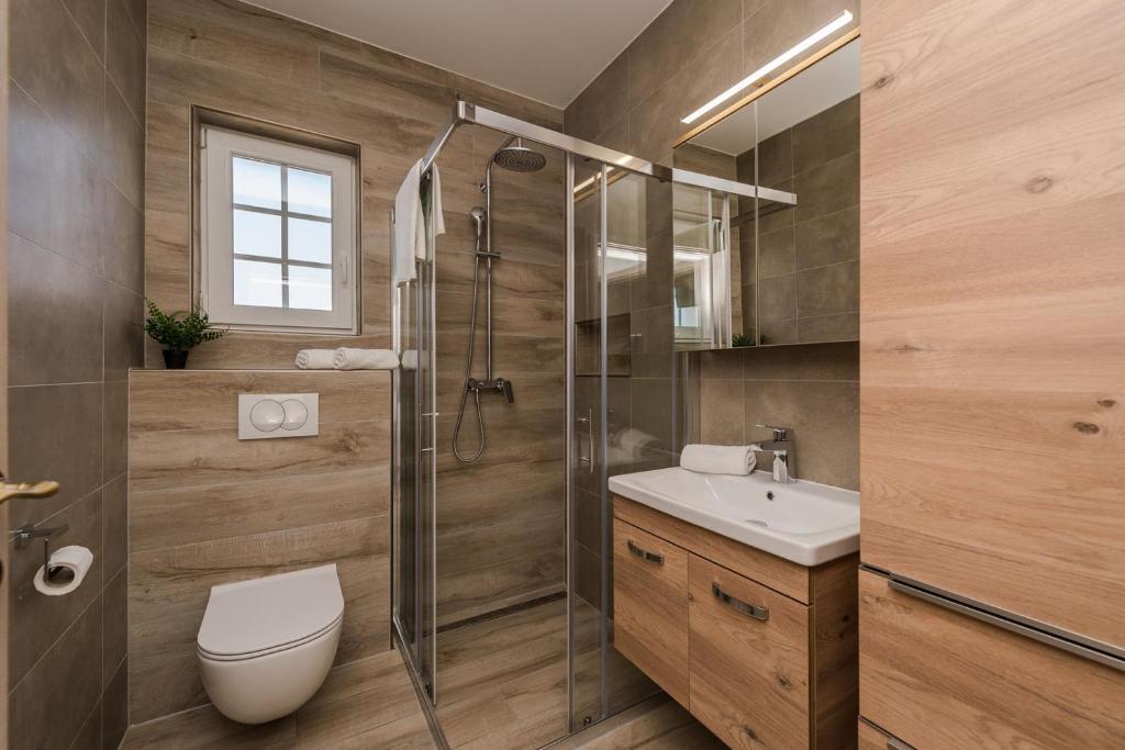 Koupelna v ubytování Villa Stancija Privlaka 1 with heated pool