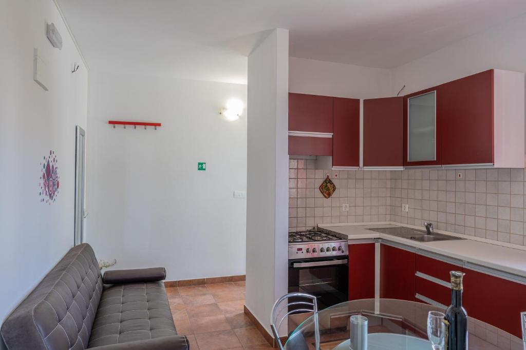 Kuchyň nebo kuchyňský kout v ubytování Guesthouse Kamarin