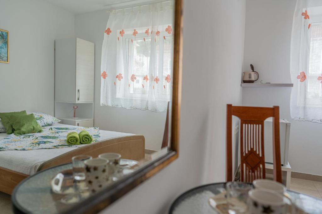 Postel nebo postele na pokoji v ubytování Guesthouse Kamarin