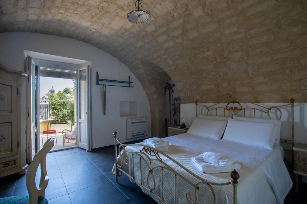 Voodi või voodid majutusasutuse Bed and Breakfast Terra del Sole Ibla toas