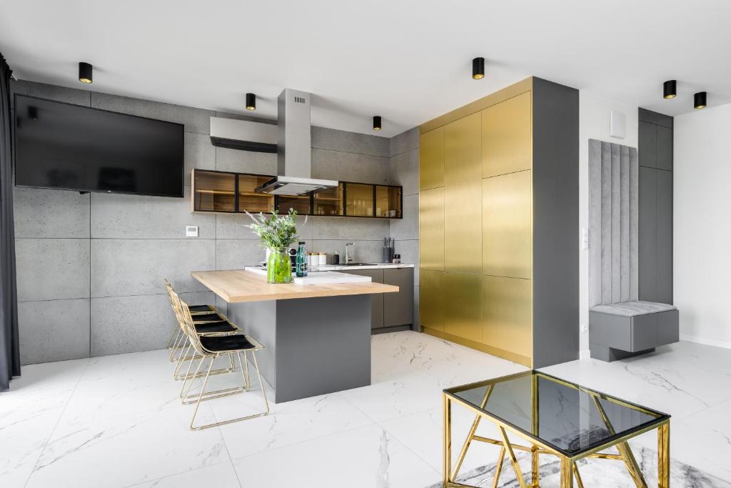 Kuchyň nebo kuchyňský kout v ubytování EL Apartments - Aries