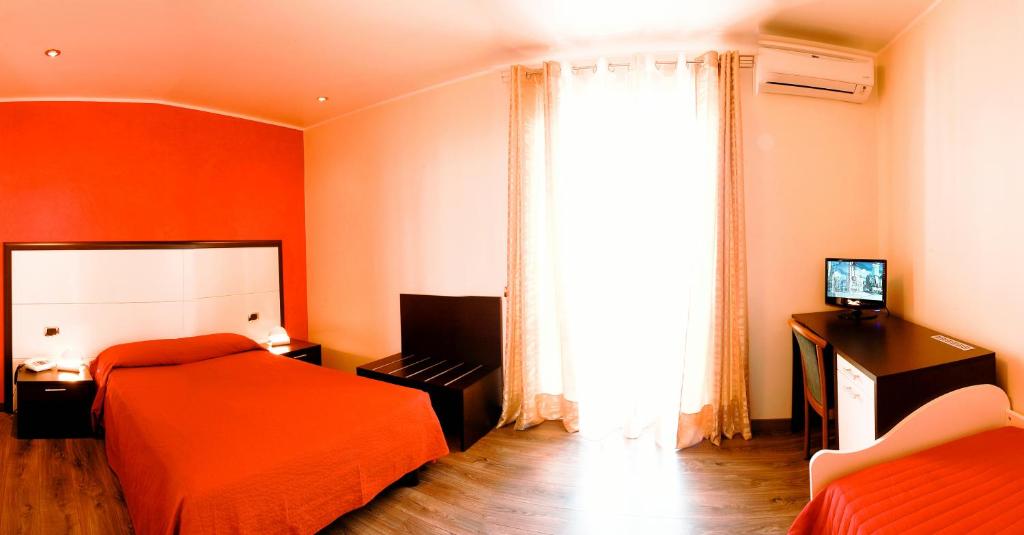 Posteľ alebo postele v izbe v ubytovaní La Bastia Hotel & Resort