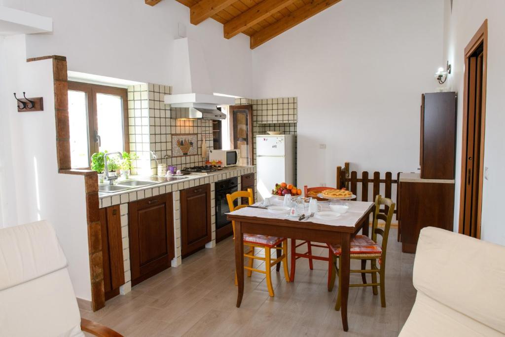 Kuchyň nebo kuchyňský kout v ubytování Terrazzo sullo Ionio