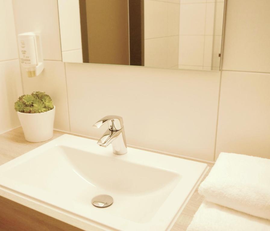 Koupelna v ubytování KELKO 1A Hotel