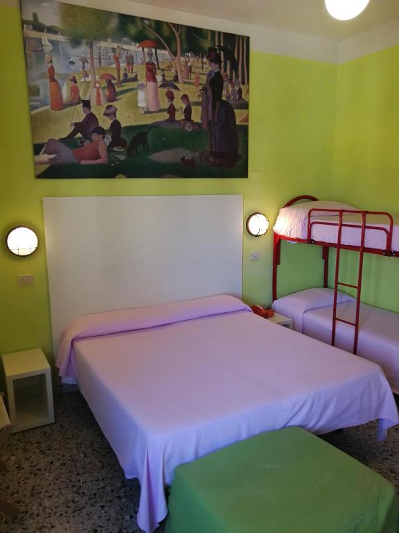 Postel nebo postele na pokoji v ubytování Hotel Biagiotti