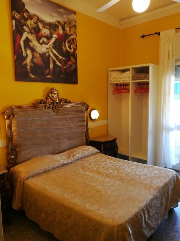 Postel nebo postele na pokoji v ubytování Hotel Biagiotti