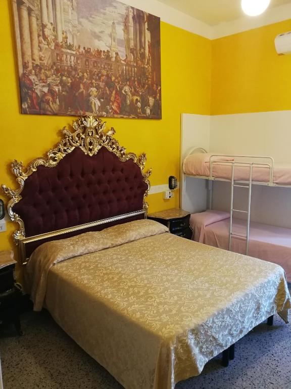 Postel nebo postele na pokoji v ubytování Hotel Biagiotti