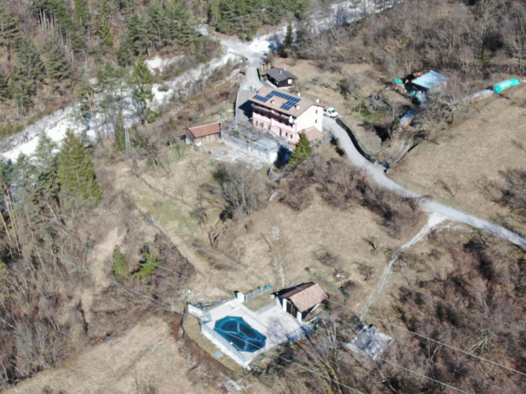 an aerial view of a house on a hill at Rosa Dei Venti in Moggio Udinese