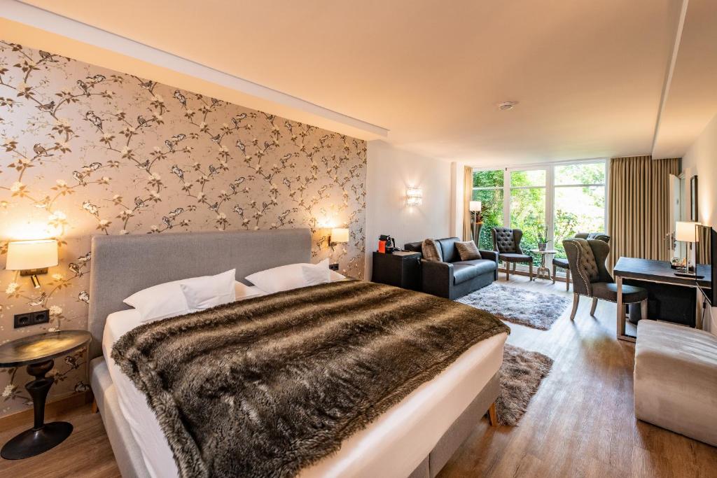 Postel nebo postele na pokoji v ubytování Boutique-Hotel Villa Anna