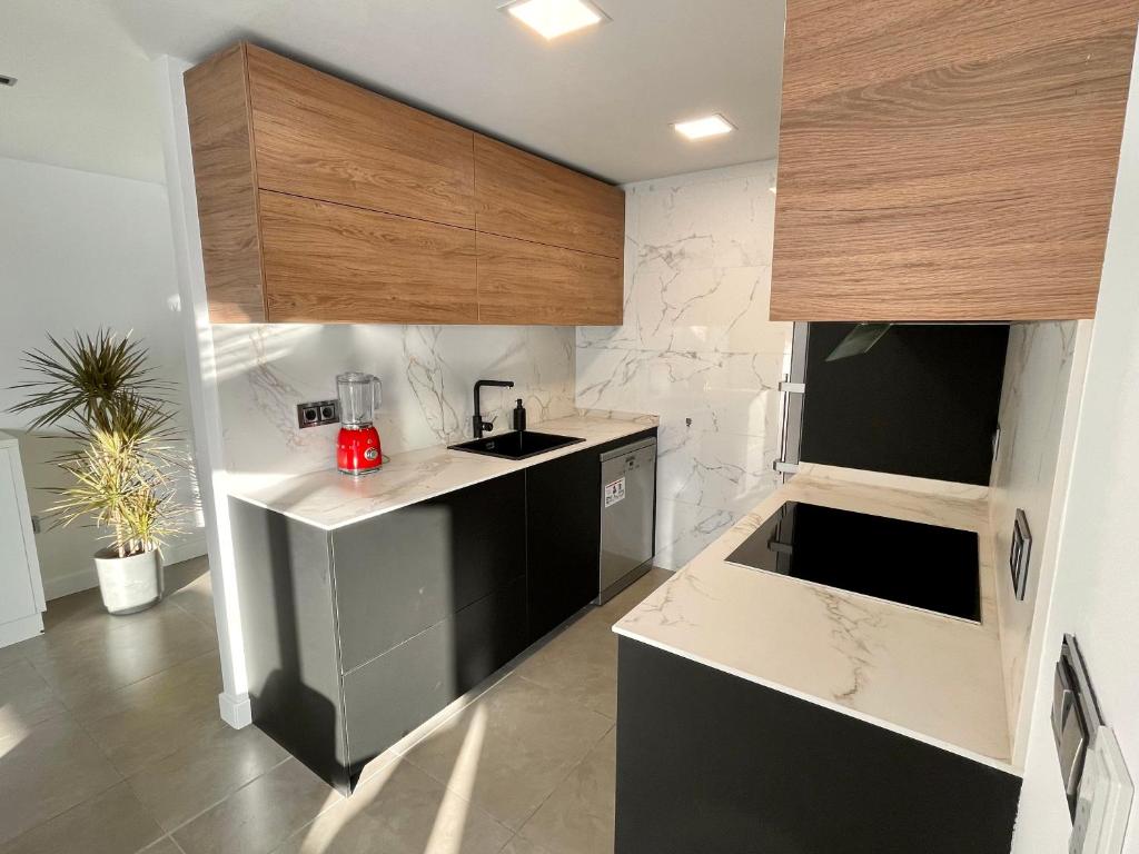 A kitchen or kitchenette at Luxury boutique playa Silgar