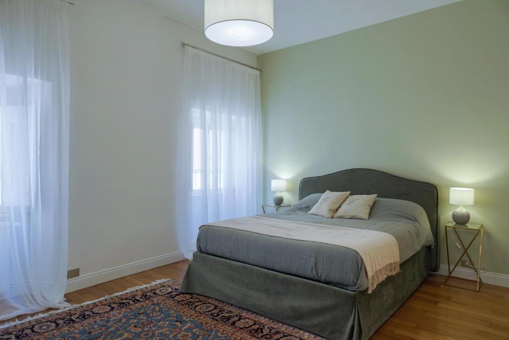 Łóżko lub łóżka w pokoju w obiekcie Barberini Apartment