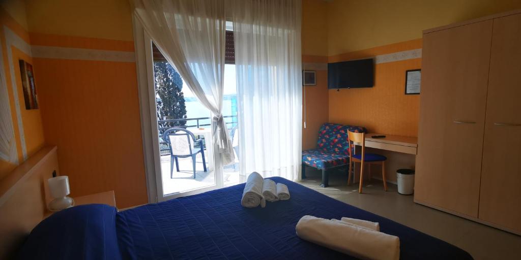 Postel nebo postele na pokoji v ubytování Hotel Aquavite