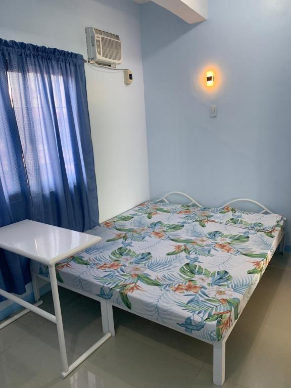 Postel nebo postele na pokoji v ubytování RGC Residences
