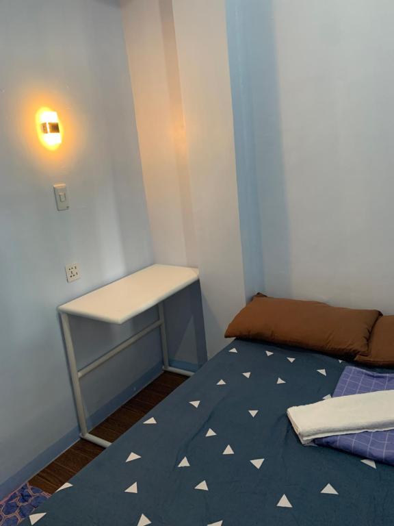 Postel nebo postele na pokoji v ubytování RGC Residences