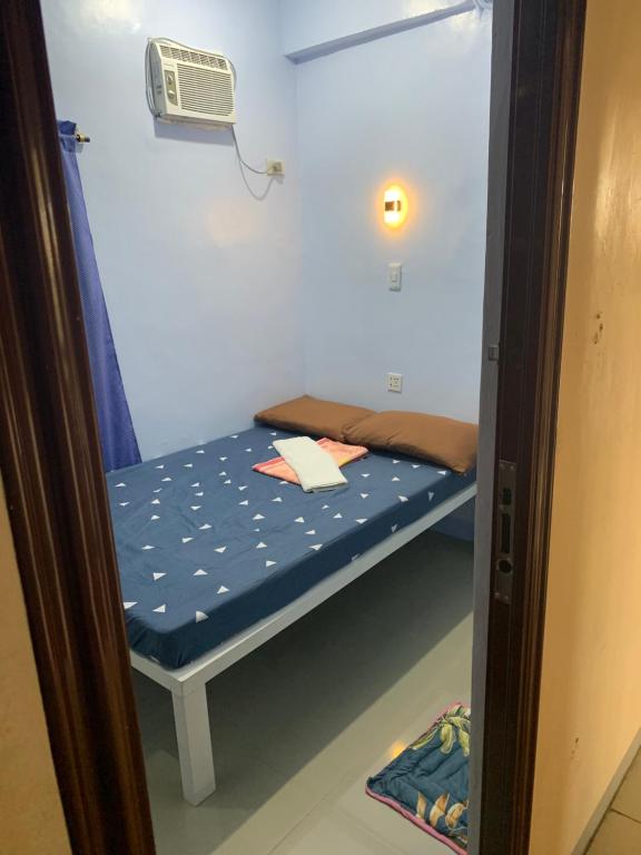 Postel nebo postele na pokoji v ubytování RGC Residences