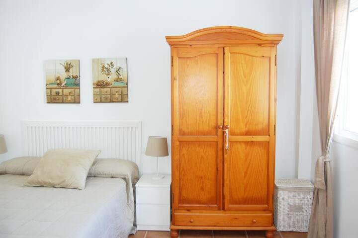 Łóżko lub łóżka w pokoju w obiekcie Chalet Paraíso Buganvillas