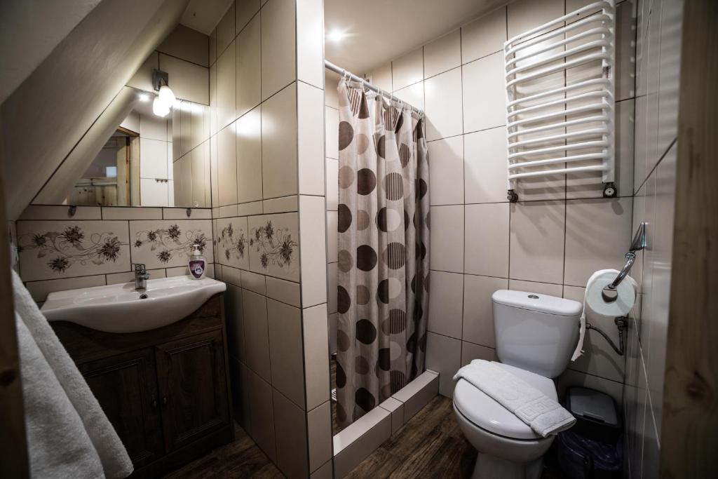Kúpeľňa v ubytovaní Apartamenty na Kasztelańskiej