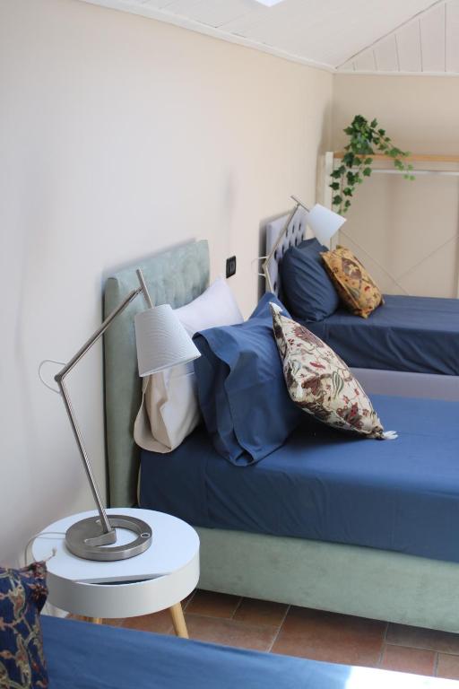 Postel nebo postele na pokoji v ubytování B&B Palazzo de "Il Nuovo Duca Minimo"