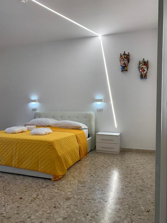 Posteľ alebo postele v izbe v ubytovaní Catania Apartment Borgo Suite Autonomous