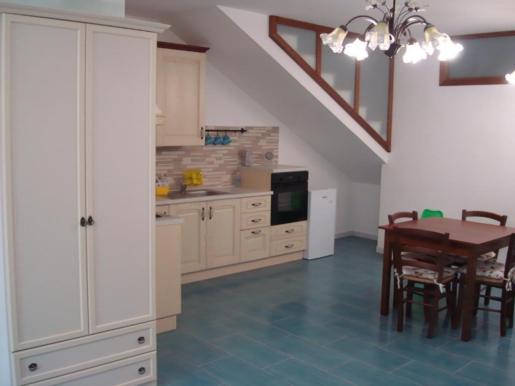 Kuchyň nebo kuchyňský kout v ubytování Guest House Mare e Luna