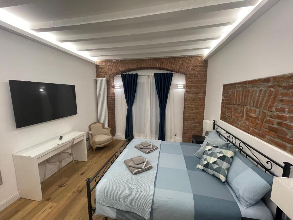 A bed or beds in a room at Luxury Apartment in Milan Center