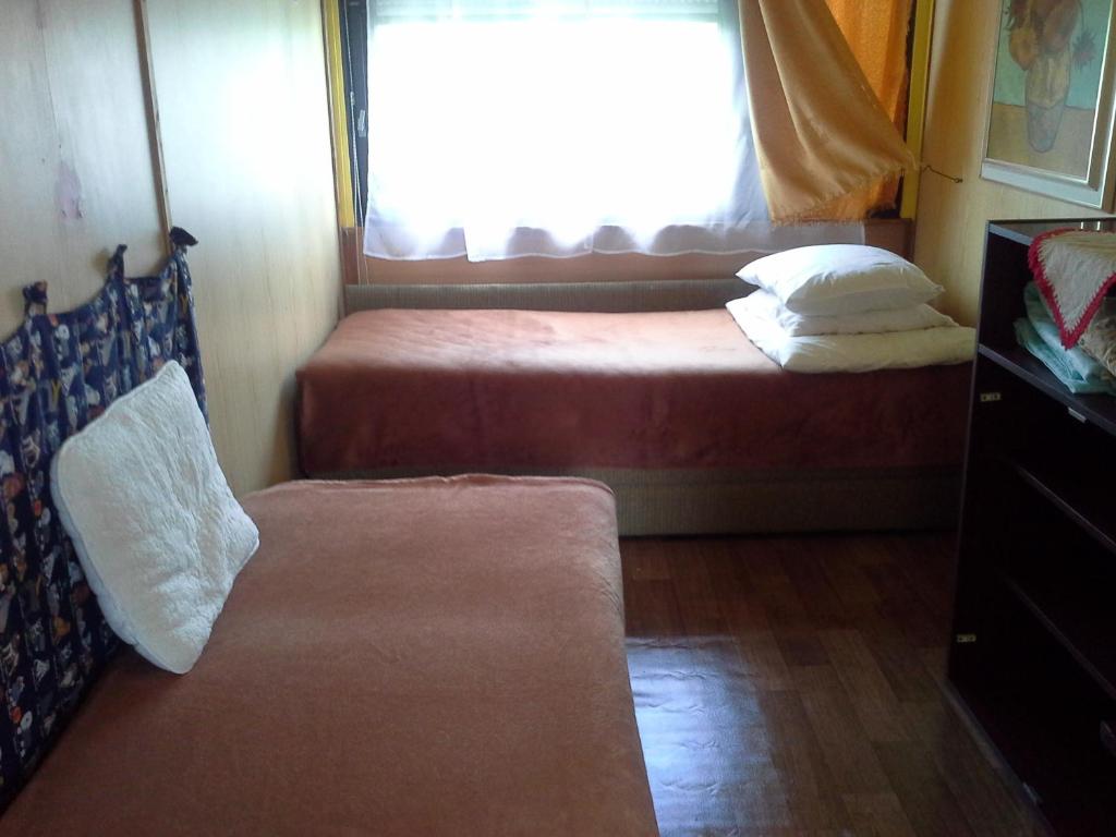 Posteľ alebo postele v izbe v ubytovaní Utulny privat