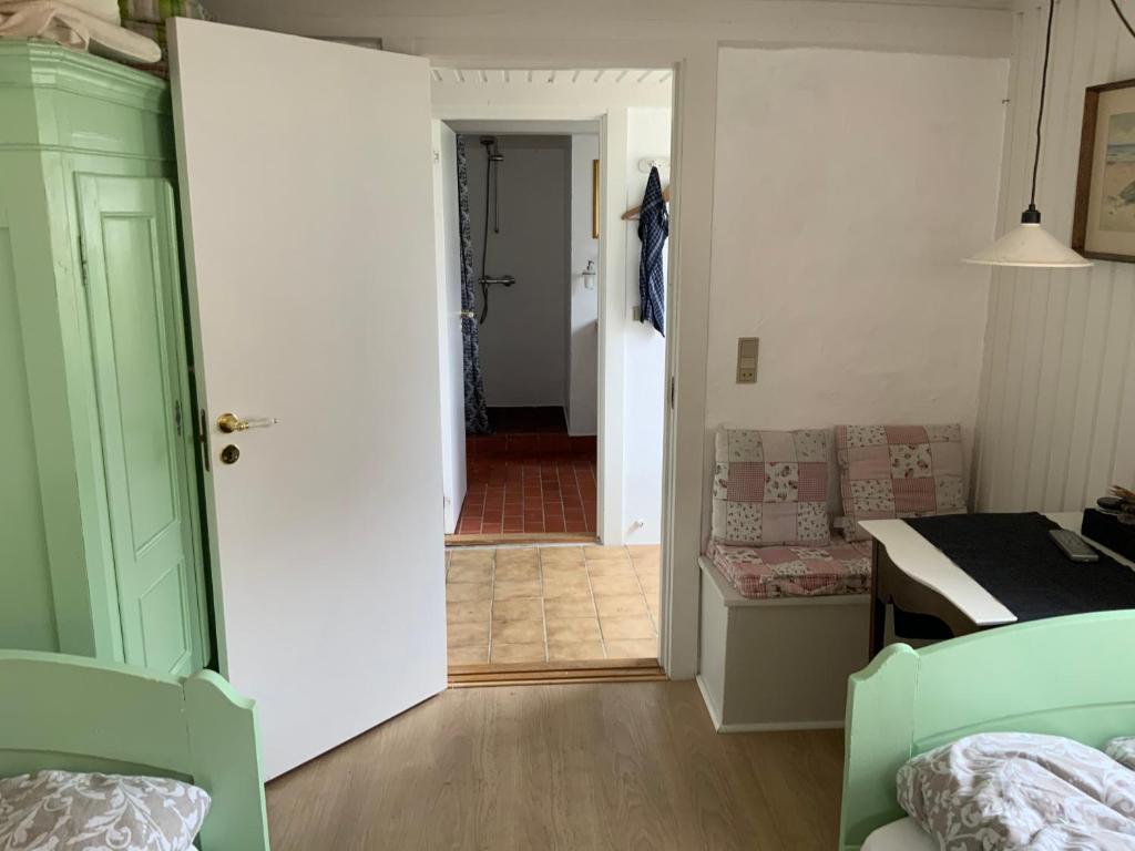 Postel nebo postele na pokoji v ubytování Brogaard Apartments