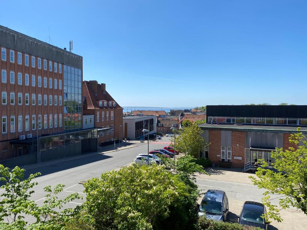 a view of a city street with buildings at Malthe Bruuns Vej 17, 1. sal in Thisted